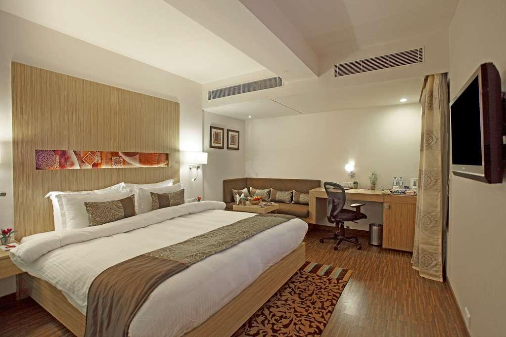 Comfort Inn Legacy Rajkot Habitación foto