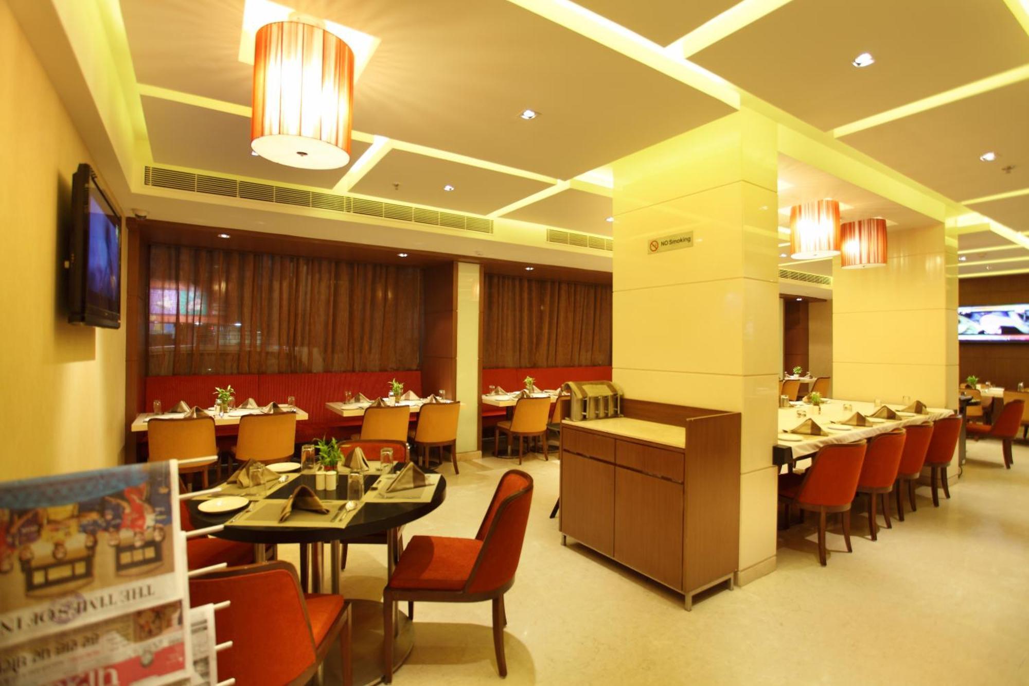 Comfort Inn Legacy Rajkot Restaurante foto